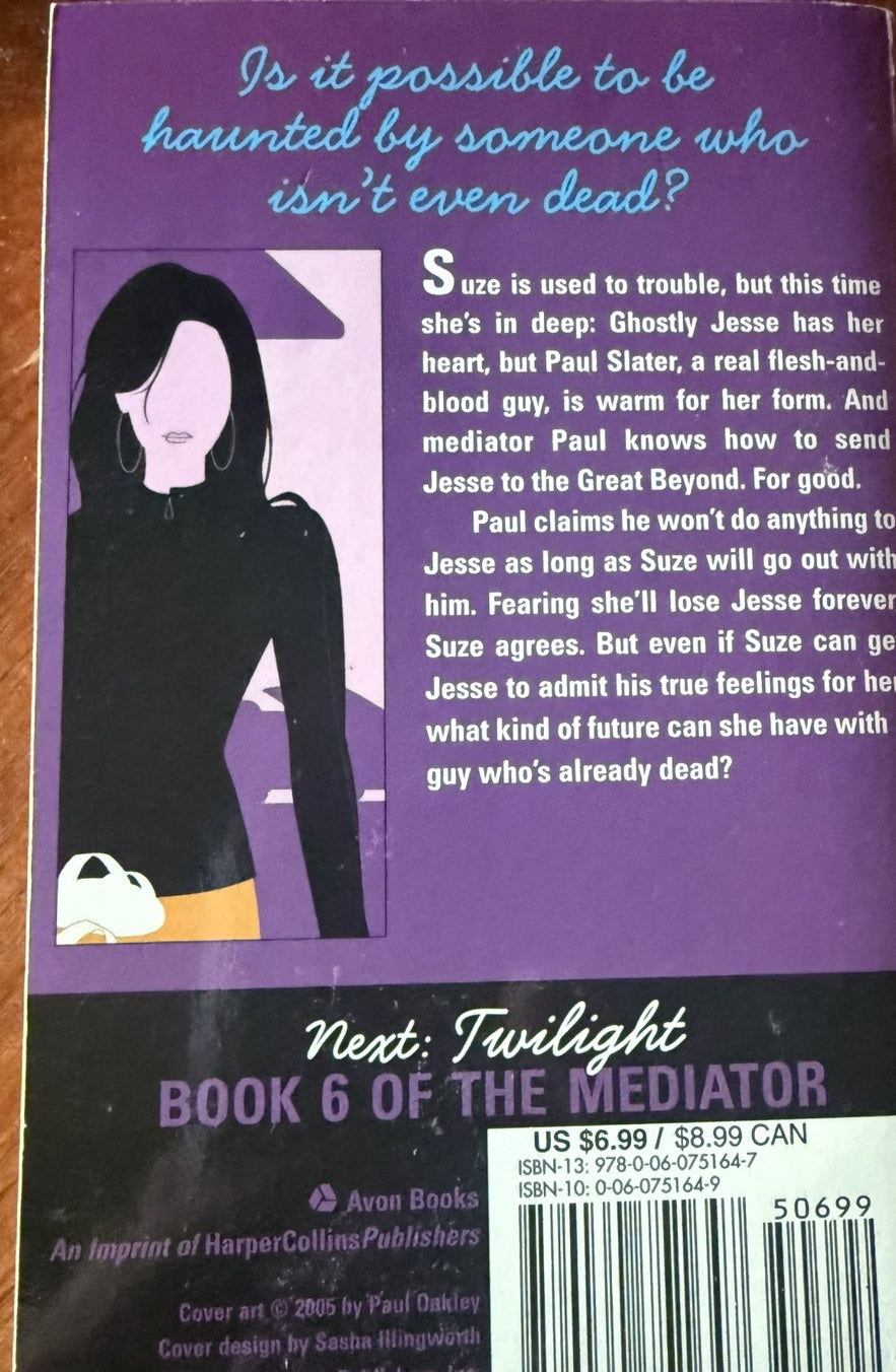 Back cover of Haunted by Meg Cabot, Book 5 in The Mediator series.