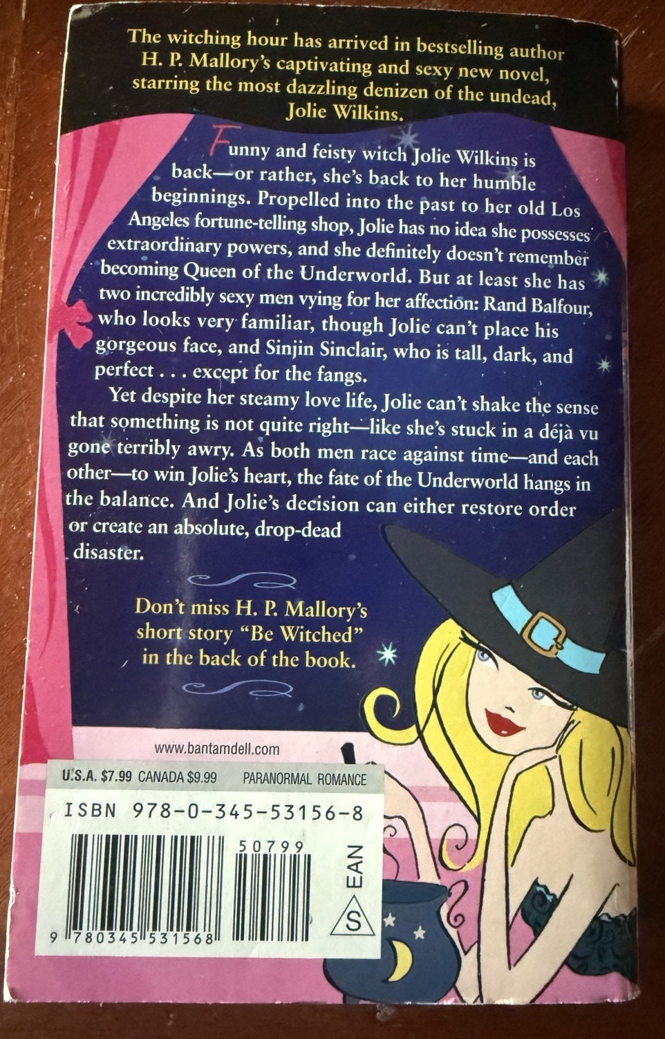 Back cover of The Witch Is Back by H. P. Mallory, showing the synopsis and barcode.