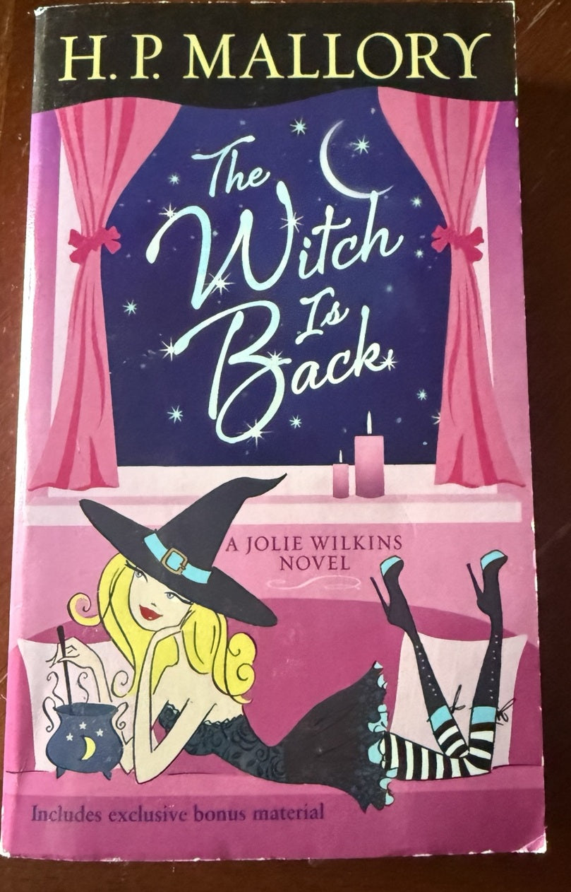 Front cover of The Witch Is Back by H. P. Mallory, a Jolie Wilkins novel.