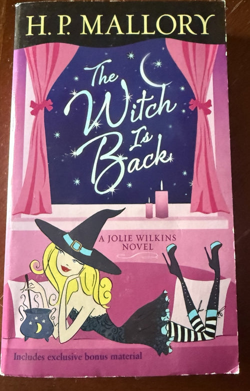Front cover of The Witch Is Back by H. P. Mallory, a Jolie Wilkins novel.