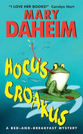 Used paperback book cover of Hocus Croakus mystery novel by Mary Daheim in like new condition