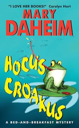 Used paperback book cover of Hocus Croakus mystery novel by Mary Daheim in like new condition