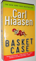 Basket Case book cover by Carl Hiaasen - used very good mass market paperback featuring satirical Florida mystery thriller