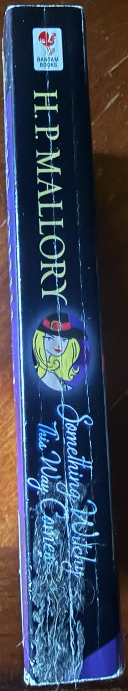 Spine of Something Witchy This Way Comes: A Jolie Wilkins Novel by H. P. Mallory