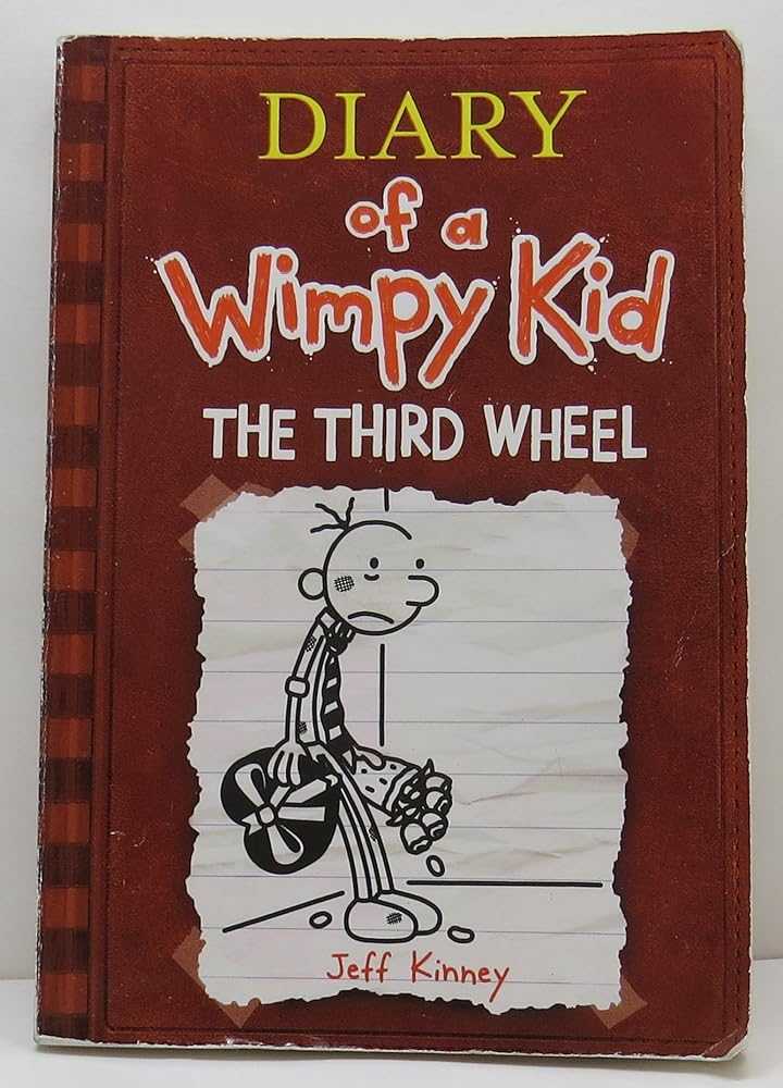 Used paperback copy of Diary of a Wimpy Kid: The Third Wheel (Diary of a Wimpy Kid #7) by Jeff Kinney at Donna's Book Corner